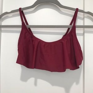 Wine red/burgundy colored ruffled bikini top.